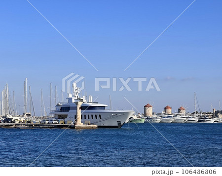 Colossus of Rhodes sunny day blue sky, Greece 106486806