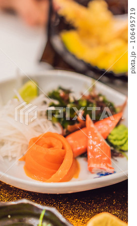 Japanese bento set. Food at a Japanese restaurant VERTICAL FORMAT for Instagram mobile story or stories size. Mobile wallpaper Japanese bento set. Food at a Japanese restaurant VERTICAL FORMAT for Instagram mobile story or stories size. Mobile wallpaper 106495719