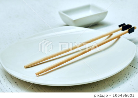 Bonded chopsticks for the inept. Oriental food, sushi, plate, gravy bowl 106496603