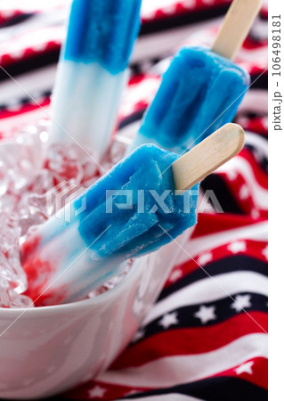 Popsicles with red, white, and blue colors. 106498181