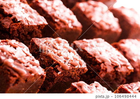 Small sweet and salry brownie bites at desesrt bar. 106498444
