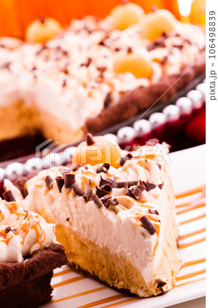 Chocolate salted caramel pumpkin cream pie for Thanksgiving. 106498839