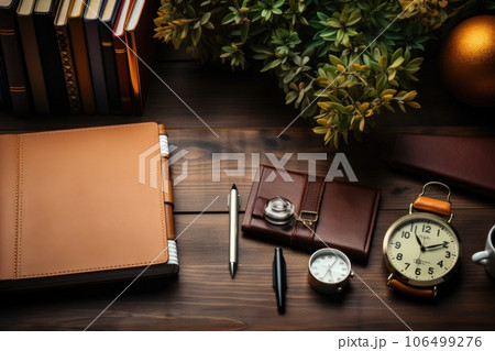 Top view Office desk with office tools, computer laptop on wood table background with copy space. Generative AI 106499276
