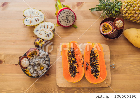 Healthy eating background of different fruits on old wooden table 106500190