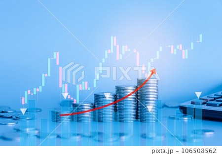 Stack of money coin and calculator with trading graph and chart. Business and finance background with blue filter. Stack of money coin and calculator with trading graph and chart. Business and finance background with blue filter. 106508562