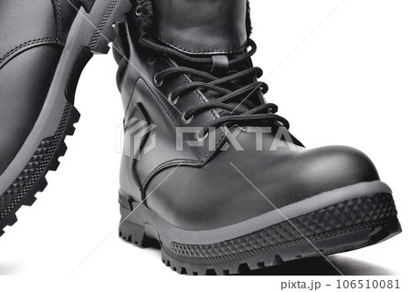 Winter men's black leather shoes on a white background, hiking shoes, practical off-road shoes, close-up details of the model, close-up i 106510081