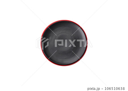 Empty ceramic black plate with christmas decoration elements Empty ceramic black plate with christmas decoration elements 106510638