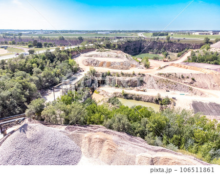 Open pit view of a quartzite rock quarry in Sioux Falls, South Dakota Open pit view of a quartzite rock quarry in Sioux Falls, South Dakota 106511861