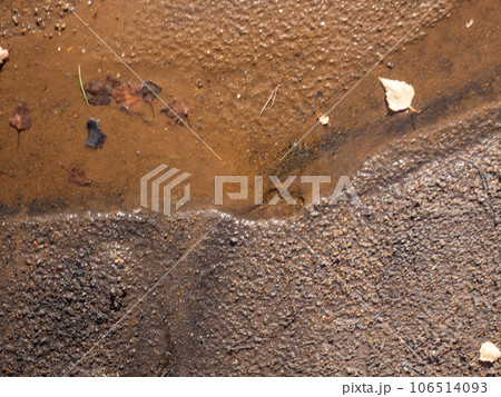Rusty sand on the beach of colapsed coal mine. Geological park 106514093
