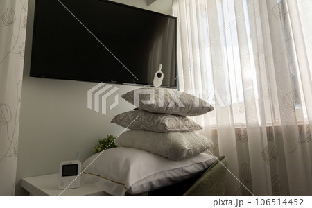 video nanny in bedroom on a pile of pillows video nanny in bedroom on a pile of pillows 106514452