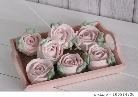 Marshmallow flowers on trays. Homemade zephyr. Close-up. Marshmallow flowers on trays. Homemade zephyr. Close-up. 106514506