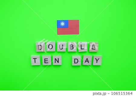 October 10, Taiwan National Day, Double Tenth Day, Taiwan flag, minimalistic banner with wooden letters on a green background October 10, Taiwan National Day, Double Tenth Day, Taiwan flag, minimalistic banner with wooden letters on a green background 106515364