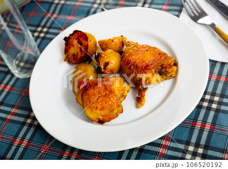 chicken with baked potatoes chicken with baked potatoes 106520192