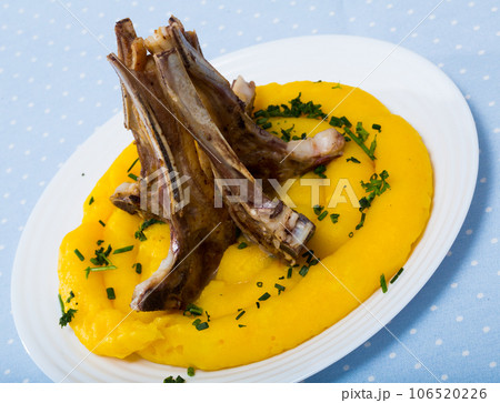 Tasty lamb ribwith mashed potato and greens, dish of norwegian cuisine pinnekjott Tasty lamb ribwith mashed potato and greens, dish of norwegian cuisine pinnekjott 106520226