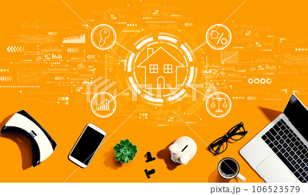 Real estate theme with electronic gadgets and office supplies 106523579