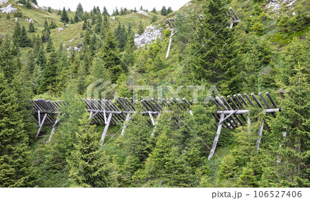Avalanche barriers old style in Italy Avalanche barriers old style in Italy 106527406