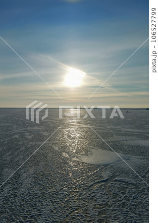 The Baltic Sea The Gulf of Riga in winter. The bay is covered with ice with small pieces of ice. Latvian winter at Ainazu beach. The Baltic Sea The Gulf of Riga in winter. The bay is covered with ice with small pieces of ice. Latvian winter at Ainazu beach. 106527799