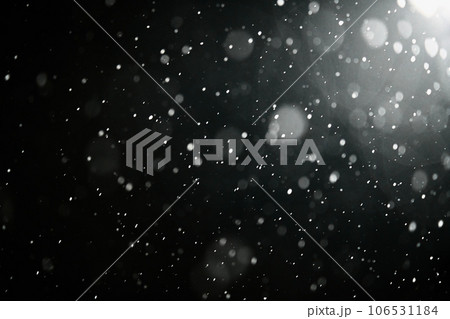 White snow isolated on dark background. Snowflakes falling down. Overlay effect for winter composition White snow isolated on dark background. Snowflakes falling down. Overlay effect for winter composition 106531184