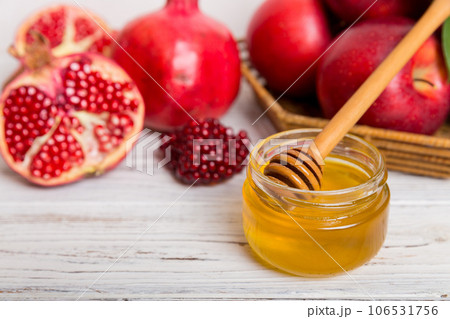 Flat lay composition with symbols jewish Rosh Hashanah holiday attributes on colored background, Rosh hashanah concept. New Year holiday Traditional. Top view with copy space Flat lay composition with symbols jewish Rosh Hashanah holiday attributes on colored background, Rosh hashanah concept. New Year holiday Traditional. Top view with copy space 106531756