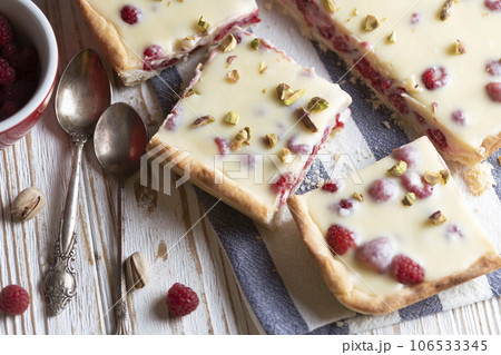 raspberry tart with white chocolate raspberry tart with white chocolate 106533345