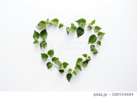 Heart shape with eco green small leaf white background. 106534084