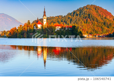 Bled, Slovenia - Sunset with Julian Alps and Church Santa Maria, beautiful Europe. Bled, Slovenia - Sunset with Julian Alps and Church Santa Maria, beautiful Europe. 106540741