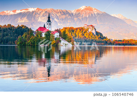 Bled, Slovenia -  Julian Alps and Church Santa Maria, beautiful autumn sunset. 106540746