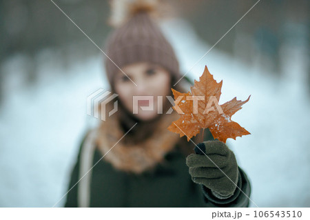 Closeup on modern female outdoors in city park in winter 106543510