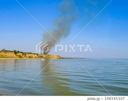 Fire on the seashore. 106545307