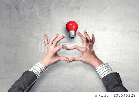 Female hands form heart shape 106545328