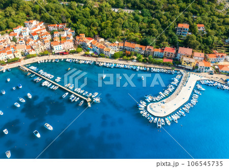 Aerial view of boats and yachts, buildings at summer sunset 106545735