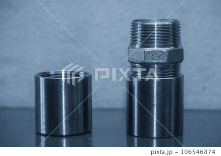 Close up scene the set of pipe connector parts made from stainless steel 304 grade . 106546874