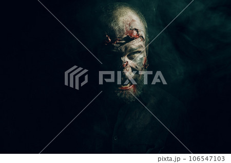 Zombie male makeup for halloween concept. Make up skin and blood face Zombie male makeup for halloween concept. Make up skin and blood face 106547103