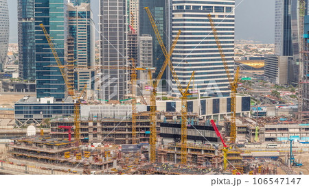 Large construction site with many working cranes timelapse. 106547147