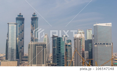 Cityscape with skyscrapers of Dubai Business Bay and water canal aerial timelapse. Cityscape with skyscrapers of Dubai Business Bay and water canal aerial timelapse. 106547148