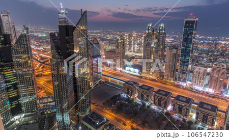 High-rise buildings on Sheikh Zayed Road in Dubai aerial day to night timelapse, UAE. 106547230