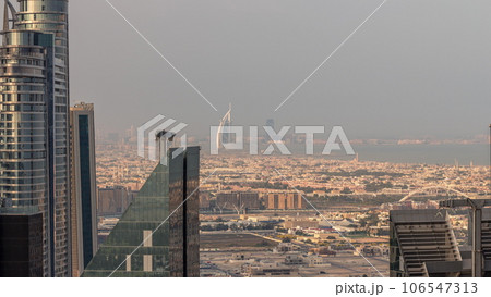 High-rise buildings on Sheikh Zayed Road in Dubai aerial timelapse, UAE. High-rise buildings on Sheikh Zayed Road in Dubai aerial timelapse, UAE. 106547313