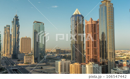 Business bay district skyline with modern architecture morning timelapse from above. Business bay district skyline with modern architecture morning timelapse from above. 106547442