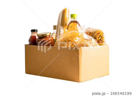 Foodstuff for donation isolated on white background with clipping path, storage and delivery. Various food, pasta, cooking oil and canned food in cardboard box. Foodstuff for donation isolated on white background with clipping path, storage and delivery. Various food, pasta, cooking oil and canned food in cardboard box. 106548199