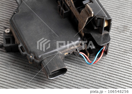 Car electric door lock, close-up. Limit switch failure, automotive part. Car electrical repair, close-up 106548256