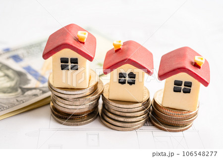 House model with stack of coin money, home loan, saving plan, installment payment finance and banking concept. 106548277