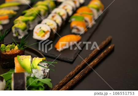 Luxurious and creative Sushi as Nigiri,Futomaki,Uramaki with Coconut chopsticks 106551753