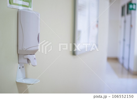 Image of disinfectant gel dispenser on hospital wall as antiviral and bacterial Image of disinfectant gel dispenser on hospital wall as antiviral and bacterial 106552150
