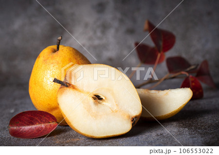 Pear cut in half 106553022