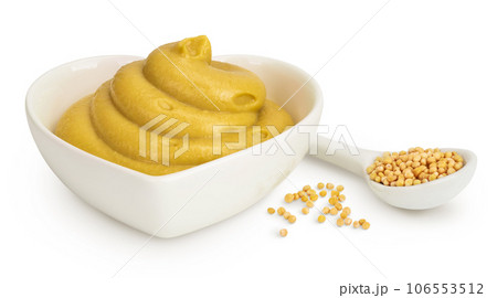 Mustard sauce in ceramic bowl with seed isolated on white background Mustard sauce in ceramic bowl with seed isolated on white background 106553512