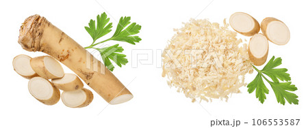 Horseradish root with slices and parsley isolated on white background. Top view. Flat lay Horseradish root with slices and parsley isolated on white background. Top view. Flat lay 106553587