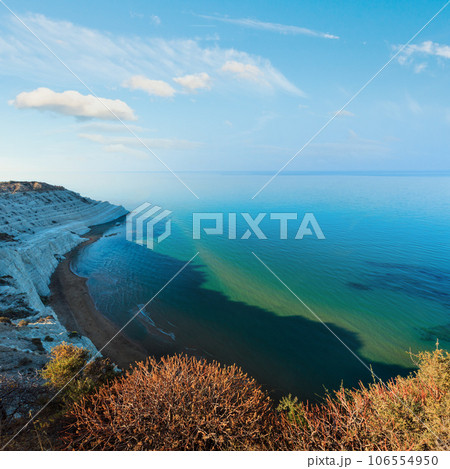 Sandy beach under famed white cliff, called "Scala dei Turchi", in Sicily, near Agrigento, Italy 106554950