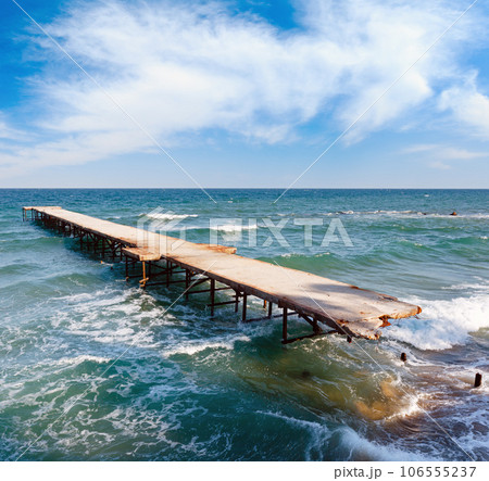 Ruined pier and evening Black Sea (Bulgaria). Ruined pier and evening Black Sea (Bulgaria). 106555237