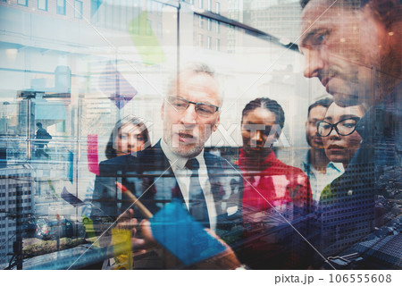 Team of business people work together on a new creative project Team of business people work together on a new creative project 106555608