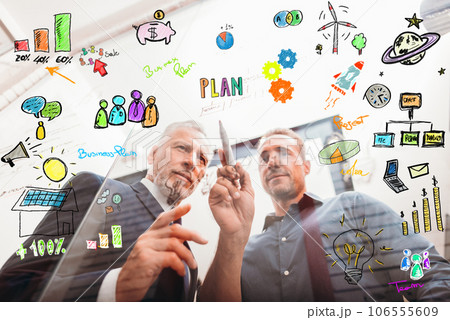 Team of business people work together on a new creative project Team of business people work together on a new creative project 106555609